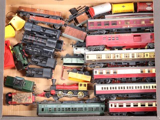 Six Dublo tank engines and items of rolling stock, contained in a fruit crate 