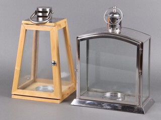 A chromed candle lantern 38cm h together with a wooden ditto 36 cm h