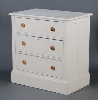 A 19th Century white painted pine chest of 3 drawers with turned handles, raised on a platform base 84cm h x 84cm w  x 49cm d  
