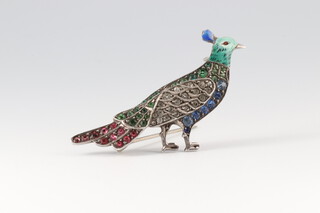 An enamelled and paste set brooch in the form of a peacock 4cm 