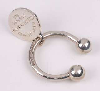 A Tiffany, Sterling silver 925 "Return to Tiffany" round tag screwball keyring,  boxed 
