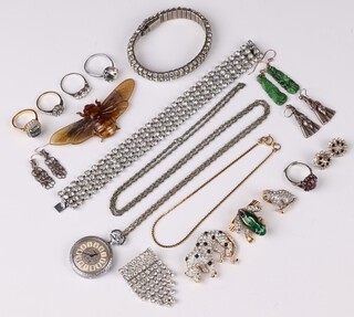 A pair of carved green hardstone earrings, 5 paste set dress rings, a scarab brooch, enamelled brooch in the form of a frog, 2 diamonte bracelets 