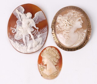 A shell carved cameo portrait brooch of a lady in a gilt metal mount 5cm, a shell carved cameo St Michael encountering the devil 5.5cm (slight chip and unmounted), 1 other portrait of a lady 4cm (unmounted) 