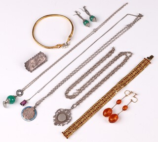 A silver box link chain hung a silver watch chain medallion and  a silver brooch 26 grams, together with  an Army Service Corps sweetheart pendant and chain, 2 gilt metal bracelets and a pair of gilt metal and amber glass earrings 