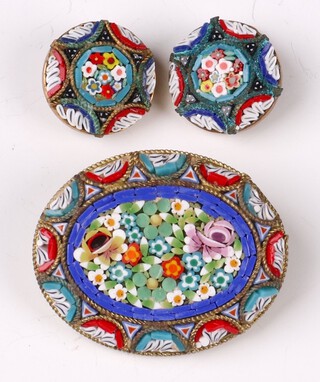 An Italian oval micro mosaic brooch with gilt mount 4cm, the back marked Italy, together with 2 ear clips