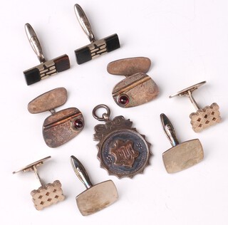 A silver watch chain medallion and 5 pairs of silver cufflinks, 54 grams 