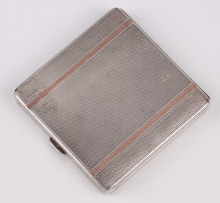 A square engine turned silver and inlaid gold powder compact, Birmingham 1950 by Harry Kenn, 7cm x 7cm, 151 grams gross  