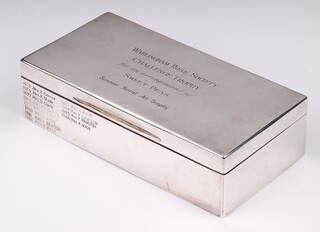 A rectangular silver cigarette box the lid inscribed Warlingham Rose Society, Birmingham 1933 with Jubilee hallmark by Davies Brothers 5cm h x 18cm w x 9cm d
