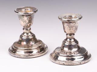 A pair of squat silver candlesticks Birmingham 1927, 9cm 