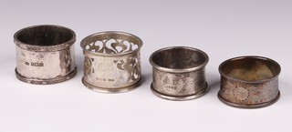A Victorian engraved silver napkin ring London 1867 and 3 other napkin rings, 110 grams 