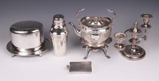 An oval silver plated biscuit barrel with hinged lid by Walker & Hall, silver plated cocktail shaker, ditto hip flask, 3 light candelabrum and a Britannia metal tea kettle (handle a/f)