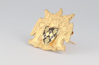 An 18ct gold and enamelled Guys Hospital badge by Fattorini Birmingham, 13.2 grams gross, with original box 