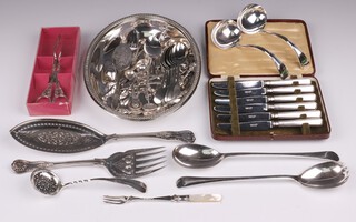 A cased set of 6 silver plated tea knives, pair of pierced silver plated fish servers, entree dish base and a collection of plated flatware
