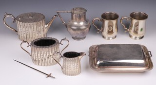 An oval silver plated entree dish and cover, 2 ditto pint tankards, Britannia metal 3 piece tea service and other plated items 