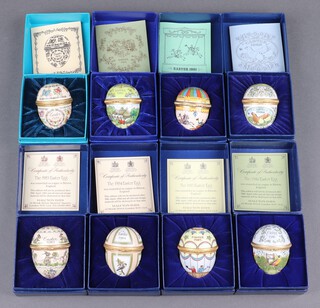 Eight various Halcyon Days enamelled Easter egg boxes, dated 1979 - 1986, all boxed