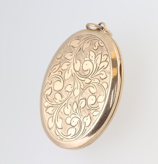 A 9ct gold oval locket, 3.5cm, 6.3 grams