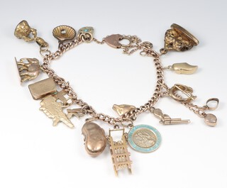 A 9ct gold charm bracelet, hung 14 9ct gold charms, a 9ct gold padlock clasp and 3 gilt metal charms, approx. 16cm, gross weight 26 grams 