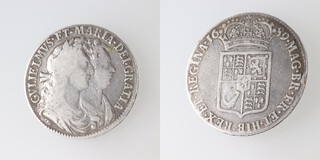 A William and Mary Halfcrown dated 1689, second reverse, PRIMO caul and interior frosted with pearls F S.3435 ( polished ) 