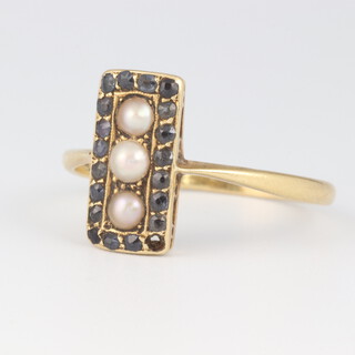 A gold marked 18ct ring set pearls and sapphires (1 sapphire missing, ring misshapen), size Q, 3.1 grams gross