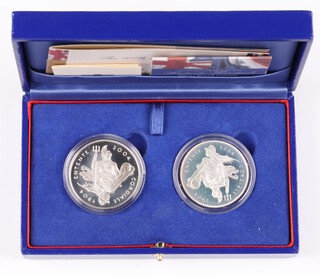 A 2004 silver proof 2 coin set commemorating 100 years of the Entente Cordiale, cased with COA