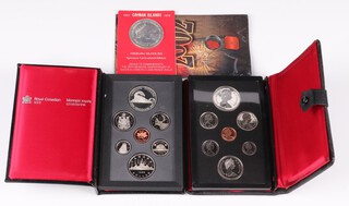 A collection of Canadian Proof coinage to include 1975 and 1986 sets, a 1972 sterling commemorative coin and a 25 cent