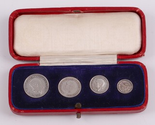 A George V 1933 Maundy set, contained in original fitted red and gilt case 