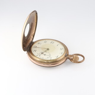 A gentleman's demi hunter pocket watch with enamelled dial, Arabic numerals, contained in a gold plated case 