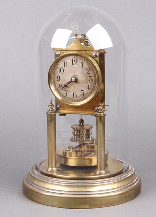 Gustav Becker, a 400 day torsion clock, the 6.5cm dial, with Arabic numerals, the back plate signed Gustav Becker Made in Germany and numbered 1414658, complete with glass dome and key 30cm h x 18cm diam. 
