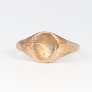 A 9ct gold signet ring, the underside with inscription "From Mum & Dad 1.3.62", size N 1/2, 4.8 grams