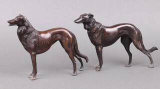 A pair of Art Deco style bronze figures of standing greyhounds 16cm h x 18cm w 