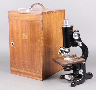 A Service No. 100751 single pillar microscope with carrying case 