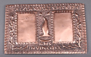 Of Falkland Island interest, a First World War embossed double easel photograph frame marked Falklands December 8th 1914, HMS Invincible and embossed a penguin 17cm x 27cm together with a photocopy of the Captain's report December 18th 1914 