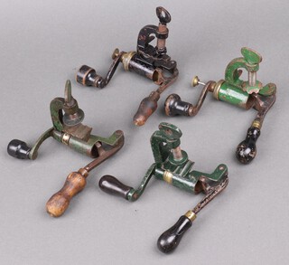 Four 19th Century shot gun cartridge crimping machines 
