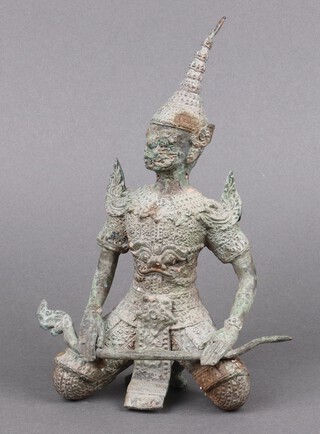 A Thai bronze figure of a seated warrior 25cm 