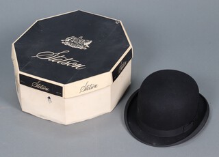 Calhoun's, a black bowler hat, size 7 3/8, boxed