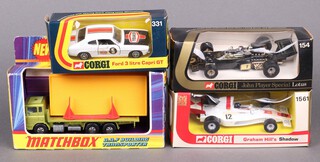 A collection of 1970's boxed vehicles to include Corgi Ford 3l Capri 331, Corgi John Player Special Lotus 154, Matchbox Super Kings K-13 transporter and a Corgi Graham Hill Shadow 1561 