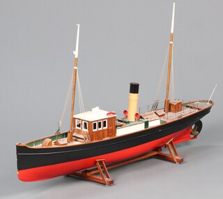 A mid-century wooden electric model pond steamer raised on supports 15cm h (including mast 67cm high) x 120cm long x 21cm wide 
