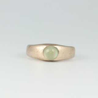 A gold testing as 14ct ring set a moonstone, size L, 3.5 grams