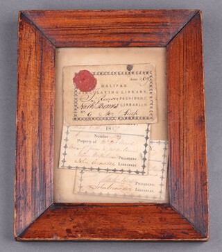 Three Halifax library tickets 1769, 1817 and 1829, contained in a wooden frame 