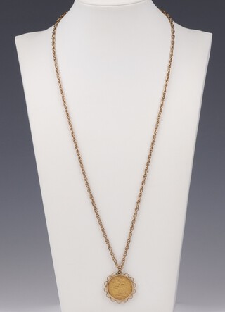 A Victoria sovereign 1884, in a gold mount with chain, testing as 9ct, 58cm, 10.6 grams gross