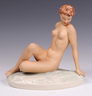A Royal Dux figure of a seated naked lady, base impressed 211P 19cm 
