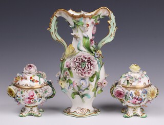 A 19th Century Coalbrookdale style twin handled vase with floral encrusted decoration 23cm h, together with a pair of Spode style floral encrusted twin handled urns with floral decoration 11cm 