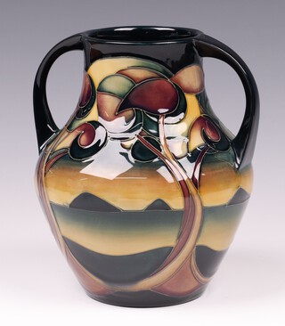 A Moorcroft Western Isles pattern twin handled vase, designed by Sian Leeper, the base marked 2000 (this vase is a second) 19cm 