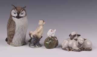 Four Royal Copenhagen figures - owl 2999 14cm, seated Pan 1738 9cm, lambs  2769 5cm and mouse 511 7cm (chips to ears) 