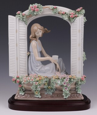 A Lladro limited edition figure "Thinking of You" 7693, no.561/4000, complete with certificate 