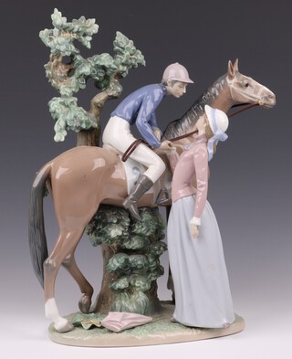 A Lladro figure - Jockey With Lass no. 5036 44cm h 
