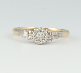 A gold and platinum marked 18ct and Plat. illusion diamond set ring, size, 2.3 grams