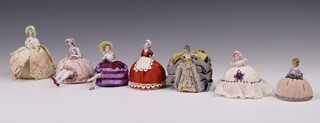 Seven 1930's  pin cushion dolls with porcelain heads and legs 9cm 