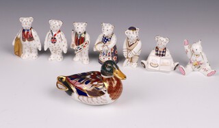 A Royal Crown Derby Imari pattern paperweight in the form of a duck with gold stopper 8cm, together with a collection of 7 Royal Crown Derby figures of bears 