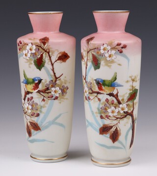 A pair of Victorian pink opaque glass vases decorated birds on branches 29cm  
